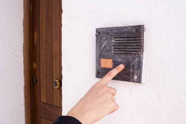 istock Woman finger ringing a buzzer. 1211535847
