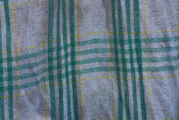 istock fabric texture with green and yellow stripes 1211538588