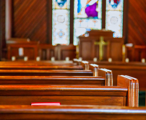 istock Church Pews with Stained Glass 1211540154