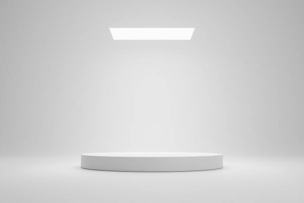 istock Empty podium or pedestal display on white room and light background with futuristic stand concept. Blank product shelf standing backdrop. 3D rendering. 1211540337