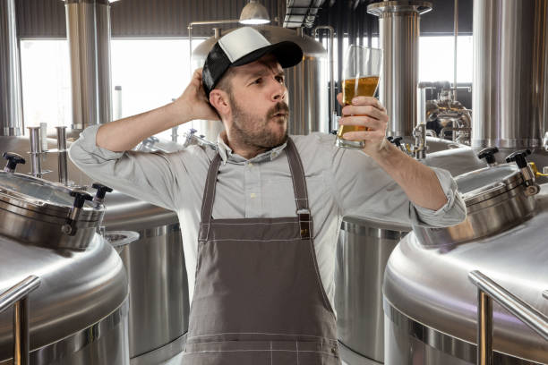 istock Professional brewer on his own craft alcohol production 1211540499