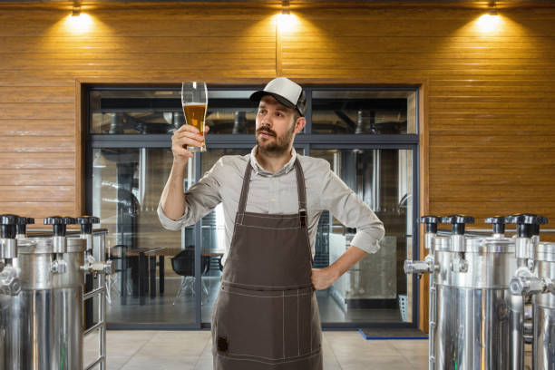istock Professional brewer on his own craft alcohol production 1211540508