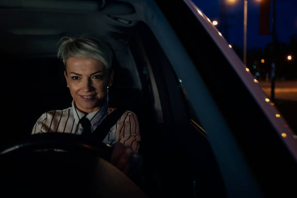 istock Woman in a car 1211542684