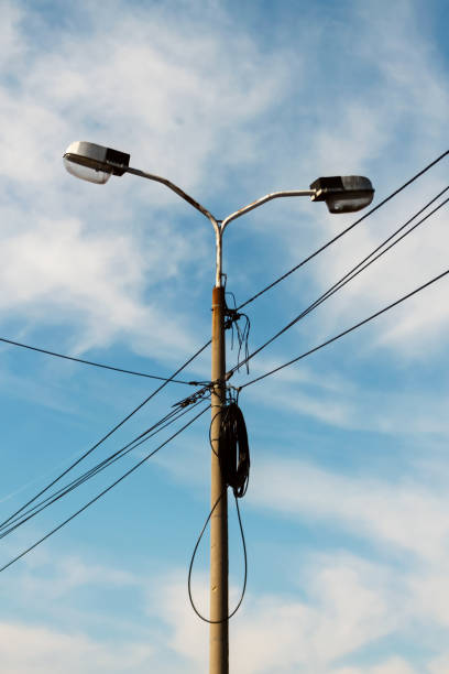 lamppost with network optical cables and wires on a pillar