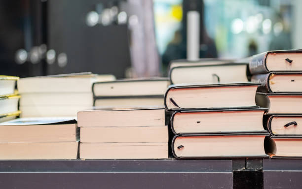 istock Book stack displayed in the book fair for business and education background 1211544497