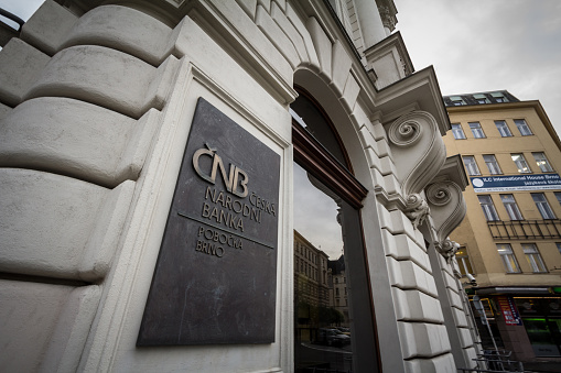 Picture of the logo of the Ceska Narodni Banka, or CNB, taken in front of the main office for Brno. The Czech National Bank, is the central bank and financial market supervisor in the Czech Republic with its headquarters in Prague, and a member of the European System of Central Banks.