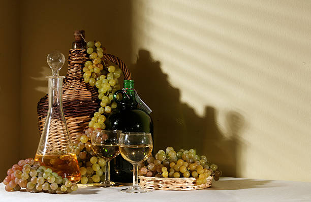 istock carafe with a wineglasses and grape 121154777