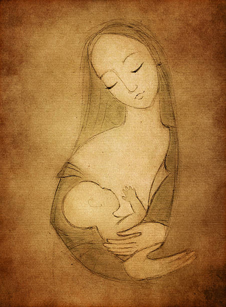 Pretty mixed race African American - Caucasian woman breastfeeding her newborn baby on sofa