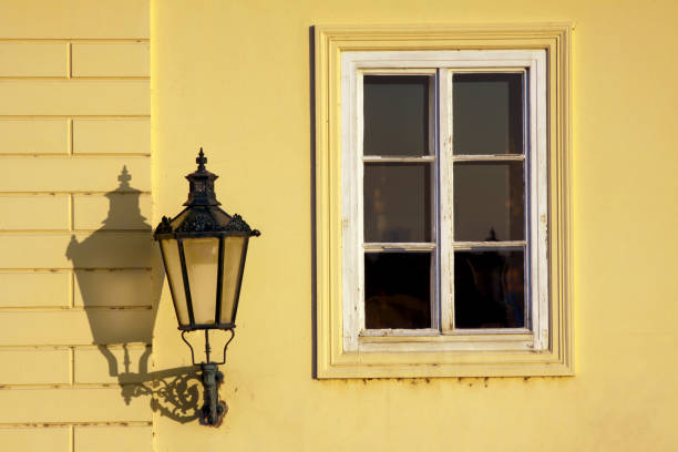 Old city wall lantern with real shadow silhouette