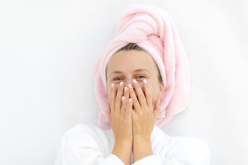Close-up of beautiful young woman with bath towel on head stock photo