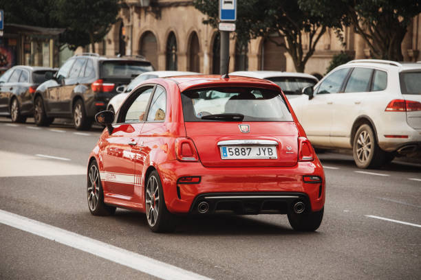 Fiat 500 Abarth Salamanca, Spain - 15 February 2020: A red Fiat 500 Abarth in a street of Salamanca, Spain. little fiat car stock pictures, royalty-free photos & images