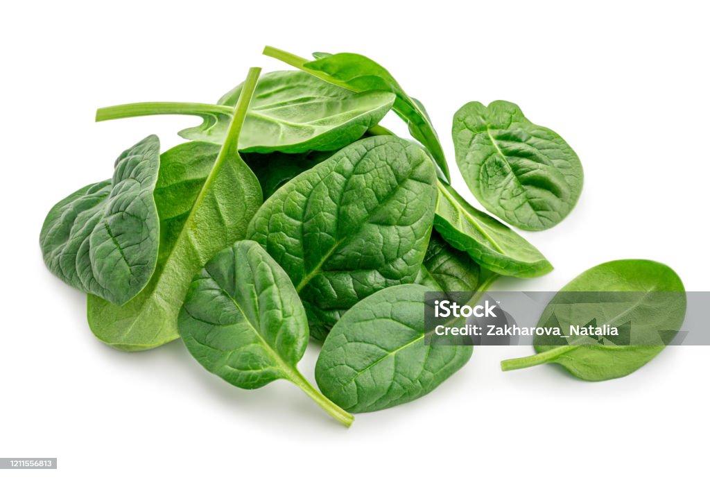 Pile of fresh green baby spinach leaves isolated  on white background. Close up Spinach Stock Photo