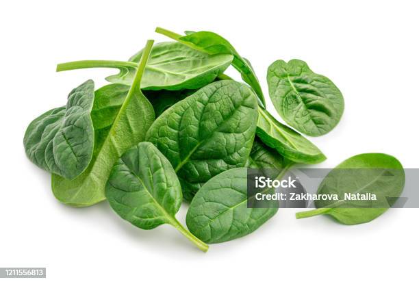 Pile Of Fresh Green Baby Spinach Leaves Isolated On White Background Close Up Stock Photo - Download Image Now