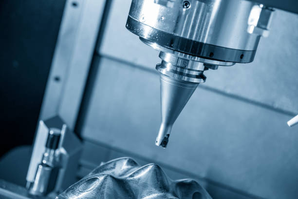 istock The CNC milling machine rough cutting  the injection mold parts by indexable  endmill tools. 1211558010