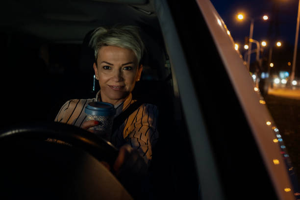 istock Woman in a car 1211559796
