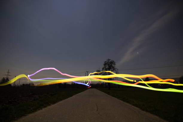 istock Rainbow colour Light painting in the night 1211560093