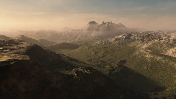 istock Mountain landscape in fog at sunrise digitally generated. 1211560220