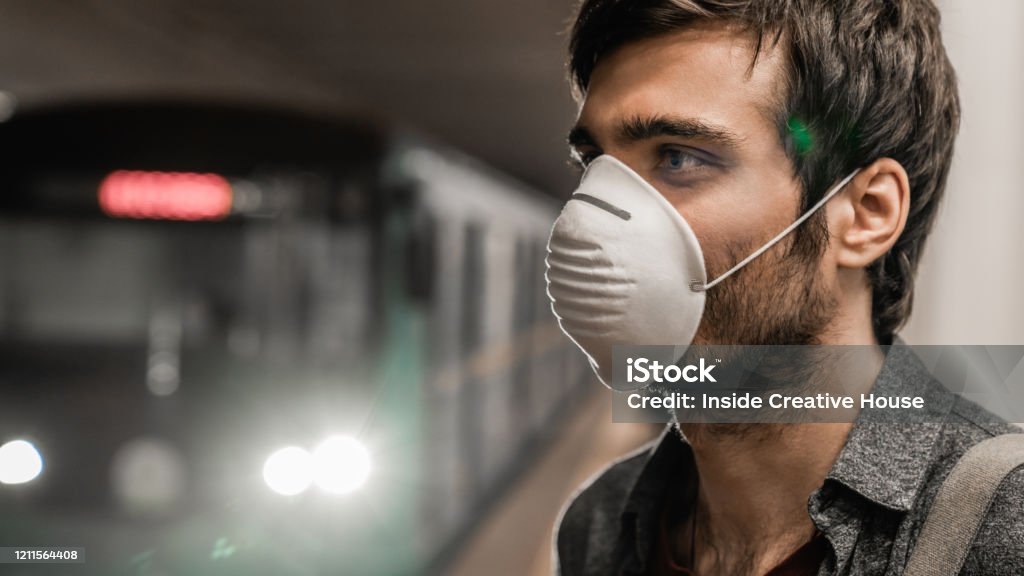 Young Caucasian Man In Protection Mask Against Virus At Public Metro Station Stock Photo - Download Image Now - iStock Young Caucasian Man In Protection Mask Against Virus At Public Metro Station Stock Photo - Download Image Now - iStock