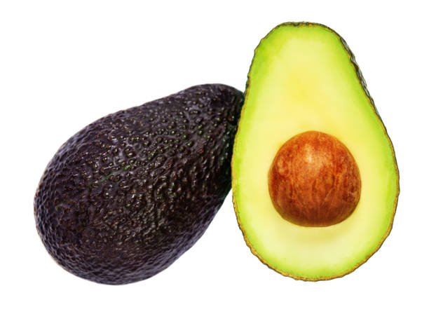 istock Avocado fruit with leaves Isolated on white background. Organic avocado with seed