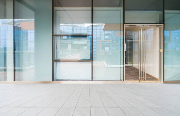 istock A modern office building with glass doors and windows 1211567631