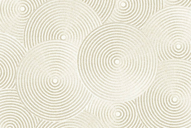 Zen sand pattern Zen sand pattern as background spiral rock stock pictures, royalty-free photos & images