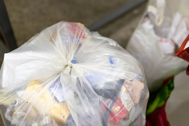 https://media.istockphoto.com/id/1211569195/photo/close-up-tied-full-household-plastic-waste-bag-filled-with-non-recyclable-rubbish-at.jpg?s=612x612&w=0&k=20&c=gDrBxiT9pmqiBWKN8zJP1qmP2Vo7S6x192y2_s6VOC8=