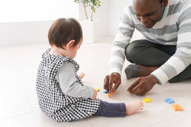 istock Baby study English with native speaker 1211571303