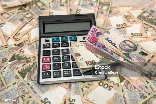 500 Hryvnia Bills With Calculator As Background Close Up Top View Stock Photo - Download Image Now