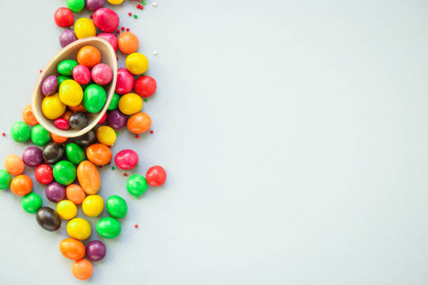 istock chocolate egg and candy Happy  easter decor. menu concept background. top view. copy space for text 1211575203