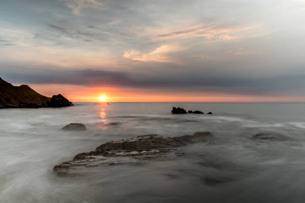 istock Perfect sunset with a creamy ocean 1211576122