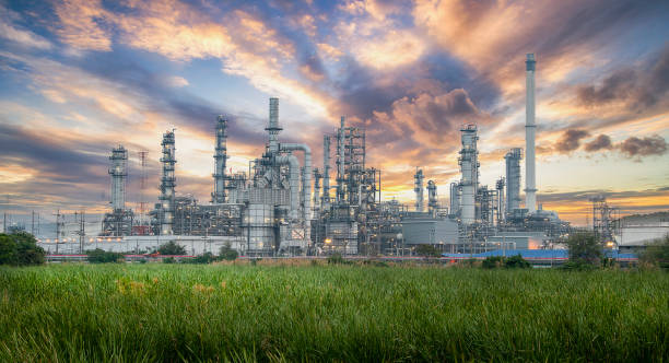 Oil and Gas Industrial zone,The equipment of oil refining,Close-up of industrial pipelines of an oil-refinery plant,Detail of oil pipeline with valves in large oil refinery. Oil and Gas Industrial zone,The equipment of oil refining,Close-up of industrial pipelines of an oil-refinery plant,Detail of oil pipeline with valves in large oil refinery. oil refinery stock pictures, royalty-free photos & images