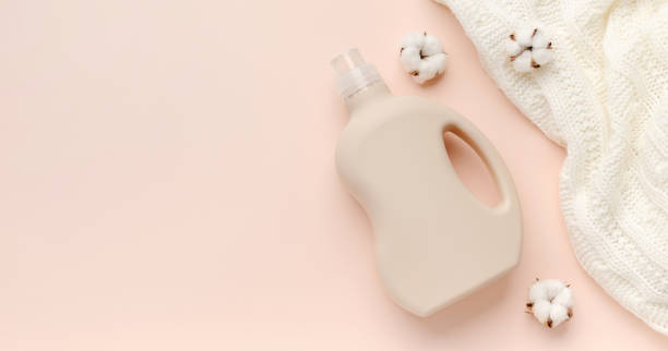 istock Plastic packaging of laundry detergent, clean sweater 1211578344
