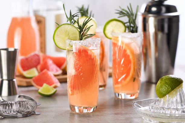 Cocktail fresh lime and rosemary combined with fresh grapefruit juice and tequila stock photo
