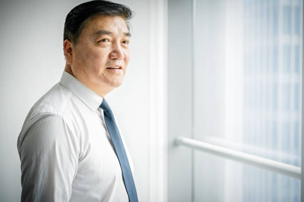 istock Asian businessman in office 1211579423