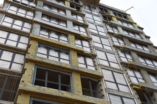 istock Mineral wool insulation of the facade building on construction site 1211579638