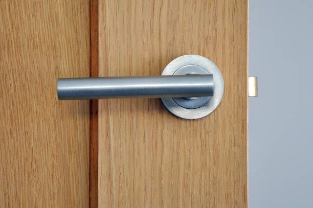istock Modern interior door with brushed aluminium door handle 1211581191