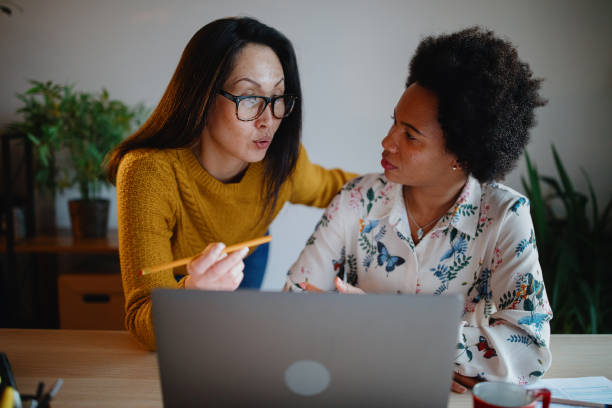 istock Businesswomen working in the office 1211585205