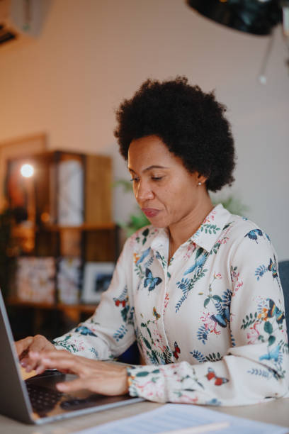istock Woman working from home office 1211586009