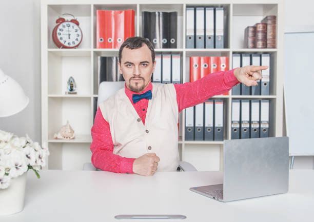 Angry boss business retro style man pointing out in office