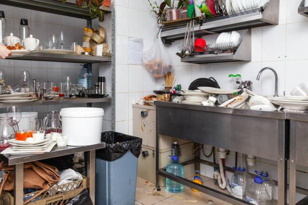 istock Restaraunt kitchen full of dirty dishes, crockery, tableware 1211590837