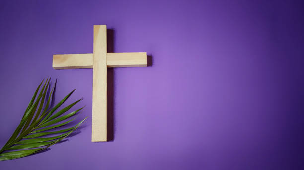 Lent Season,Holy Week and Good Friday concepts photo of wooden cross and palm leave stock photo alms stock pictures, royalty-free photos & images