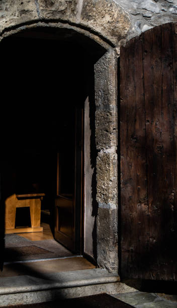 istock Old wooden door in the wall 1211593064