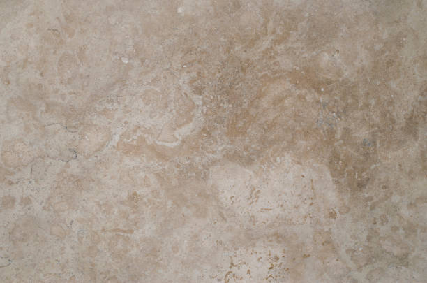 istock New beige polish travertine closeup on wall 1211595542