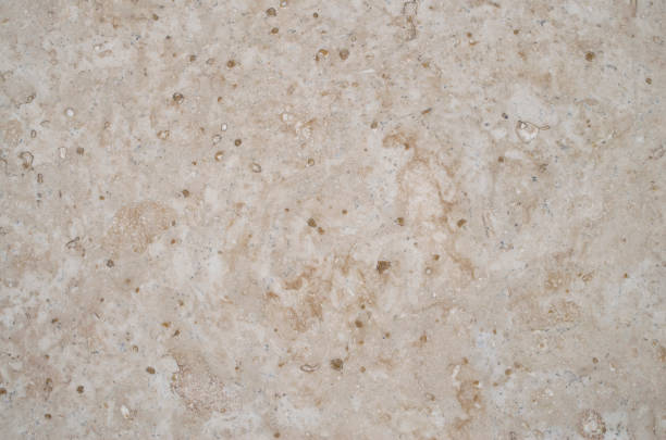 istock New beige polish travertine closeup on wall 1211595564