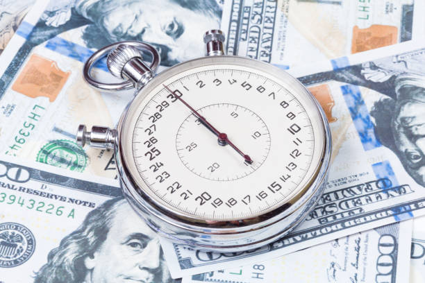 istock stopwatch on the money 1211596039