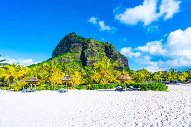 Le Morne Brabant. Le Morne stands at 556 metres high, 1821 ft, and is listed by UNESCO as a World Heritage site.