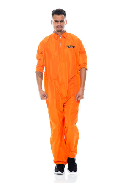 istock African ethnicity male walking in front of white background 1211597522