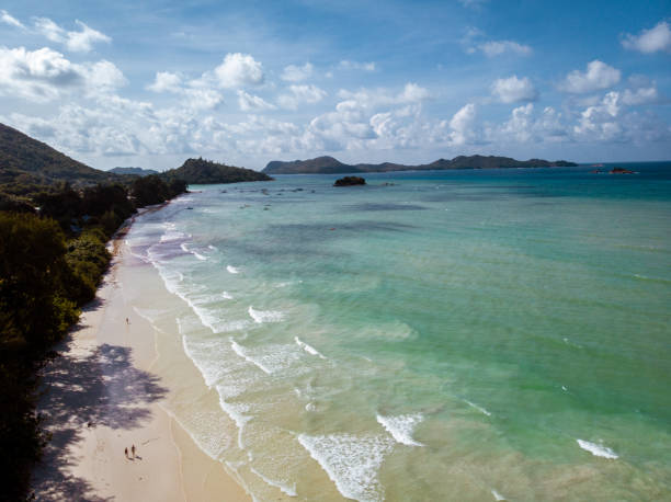 istock Praslin Seychelles, beach tropical island with palm trees Seychelles Praslin 1211598071