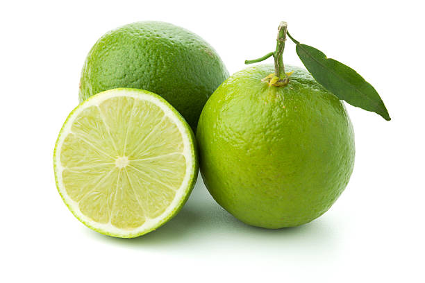 istock Ripe limes with green leaf 121160003