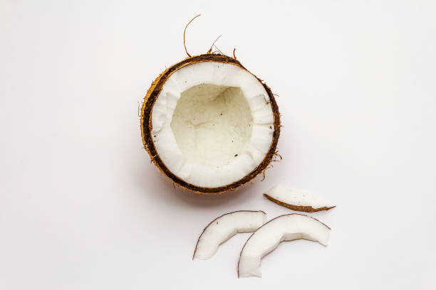 istock Ripe coconut cut on two half isolated 1211601185